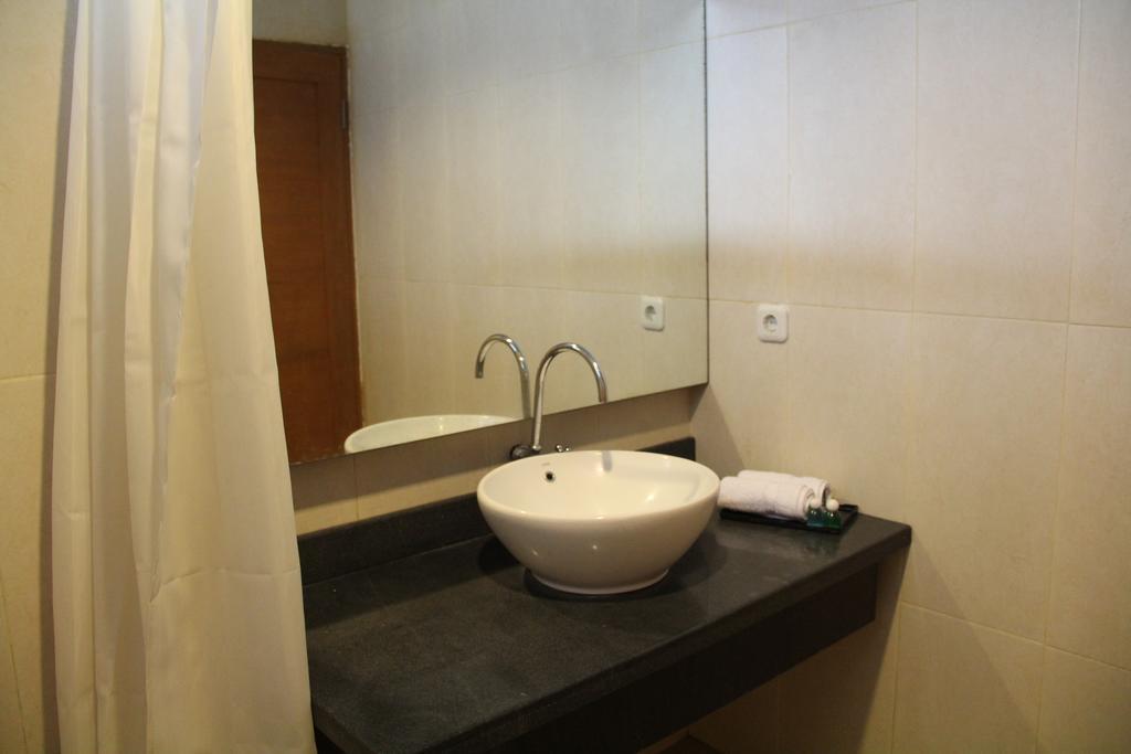 Kampoeng Nelayan Hotel Палу Номер фото
